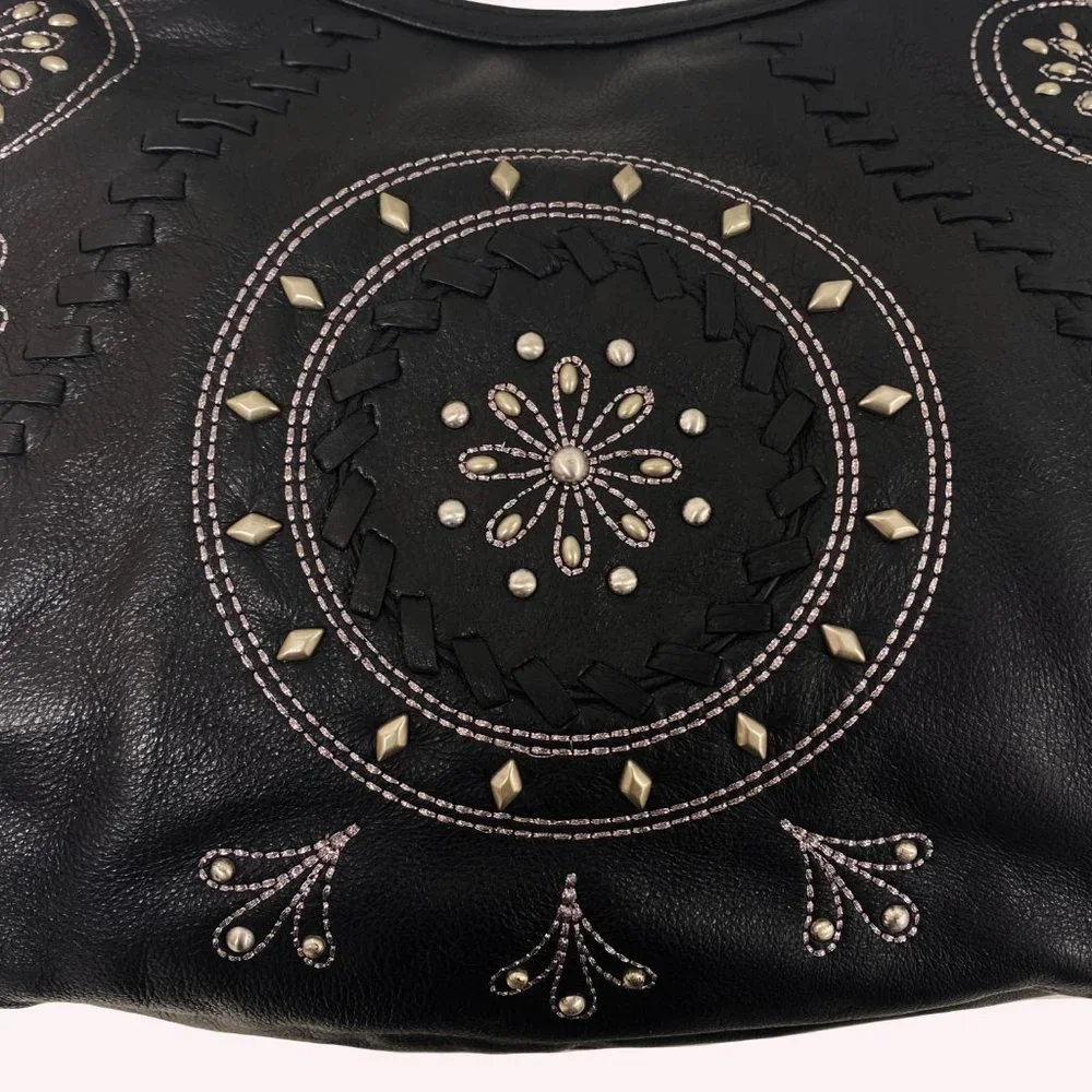 Fiore by Isabella Fiore Black Leather Studded Floral Hobo Bag Whipstitch Tassel